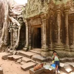 “You buy my souvenirs. You keep me on the street.”